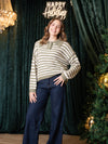 Pull con bottoncini a righe