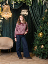 Pull con bottoncini a righe