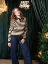 Pull con bottoncini a righe